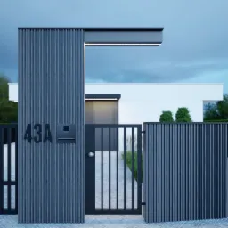 Nowoczesna brama wjazdowa z numerem domu 43A, oświetlona lampą LED, z minimalistycznym budynkiem w tle.