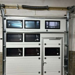 TESSA-DOM KAROL TESSA SPÓŁKA KOMANDYTOWA - BIG-TOR Brama z drzwiami serwisowymi