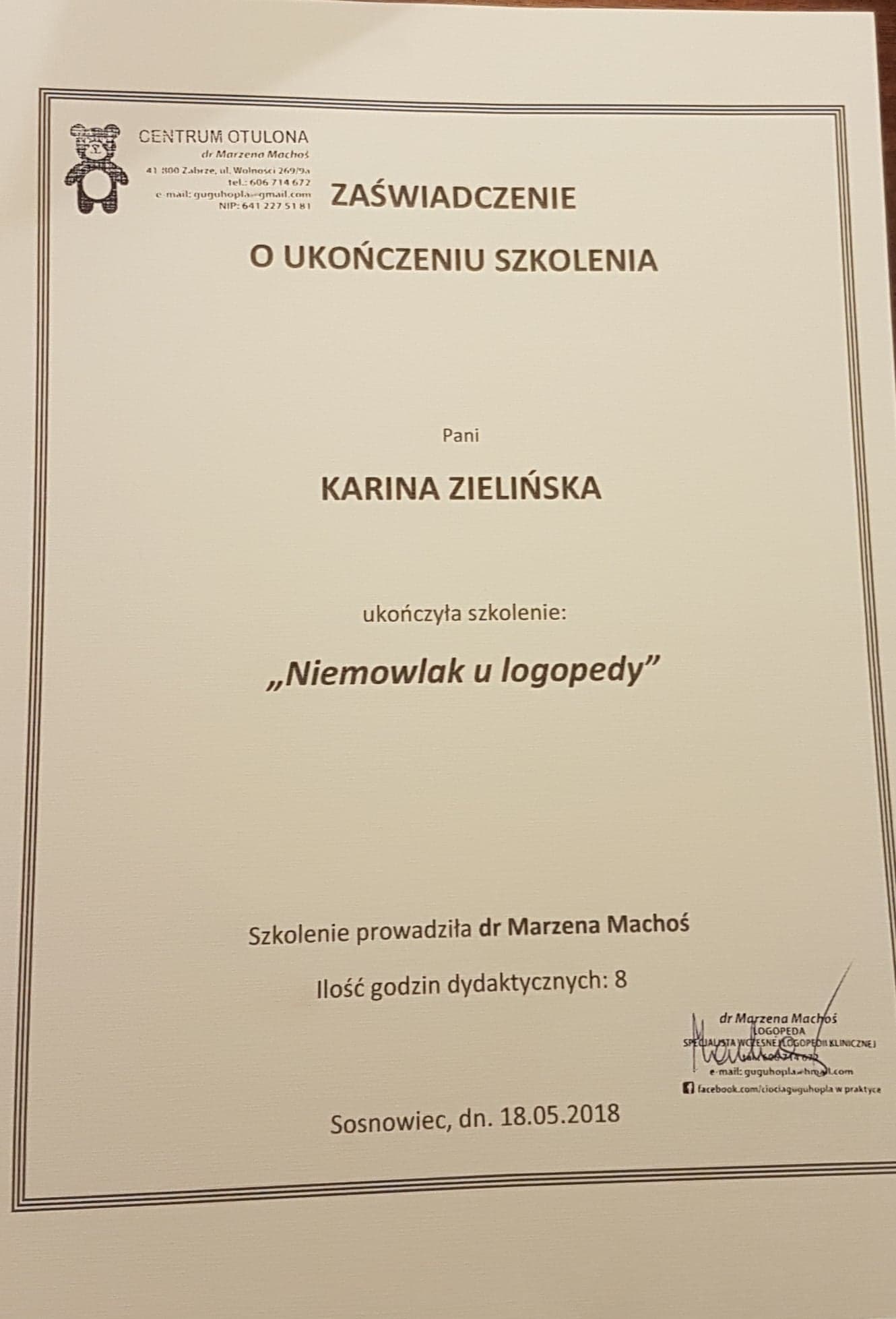 Skan zaświadczenia o ukończeniu szkolenia 'Niemowlak u logopedy' przez Karinę Zielińską, wydanego przez Centrum Otulona dr Marzena Machoś w Sosnowcu, dn. 18.05.2018.