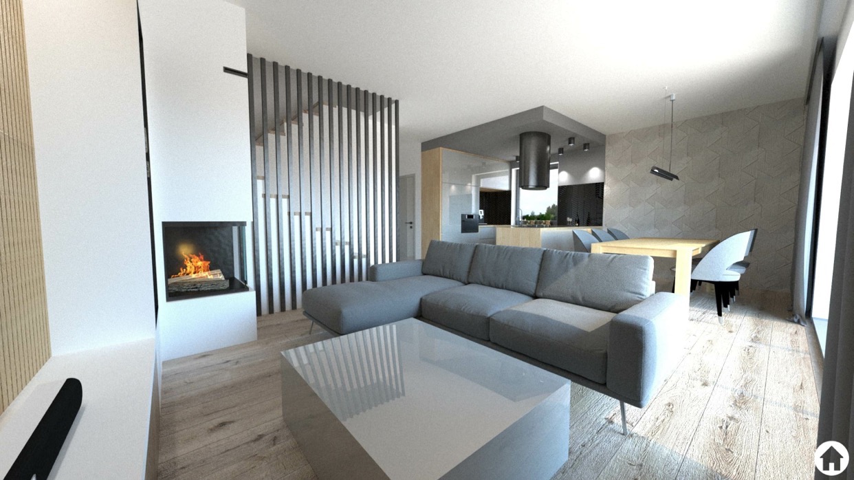 Wizualizacja salonu z kominkiem i szarą sofą narożną, widok na otwartą kuchnię z jadalnią, drewniana podłoga i dekoracyjna ścianka działowa.