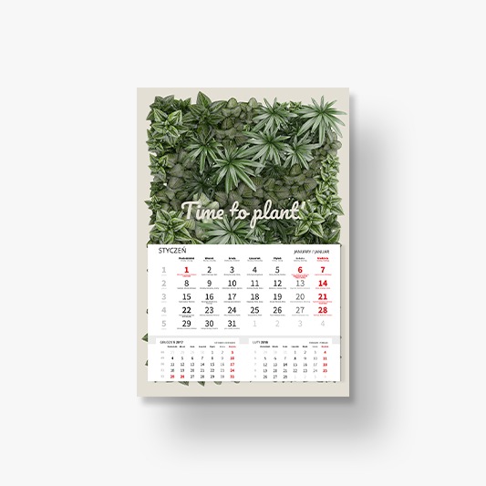 Kalendarz ścienny z motywem zielonej ściany roślinnej i napisem 'Time to plant' na górze, widoczne daty stycznia i fragmenty innych miesięcy.