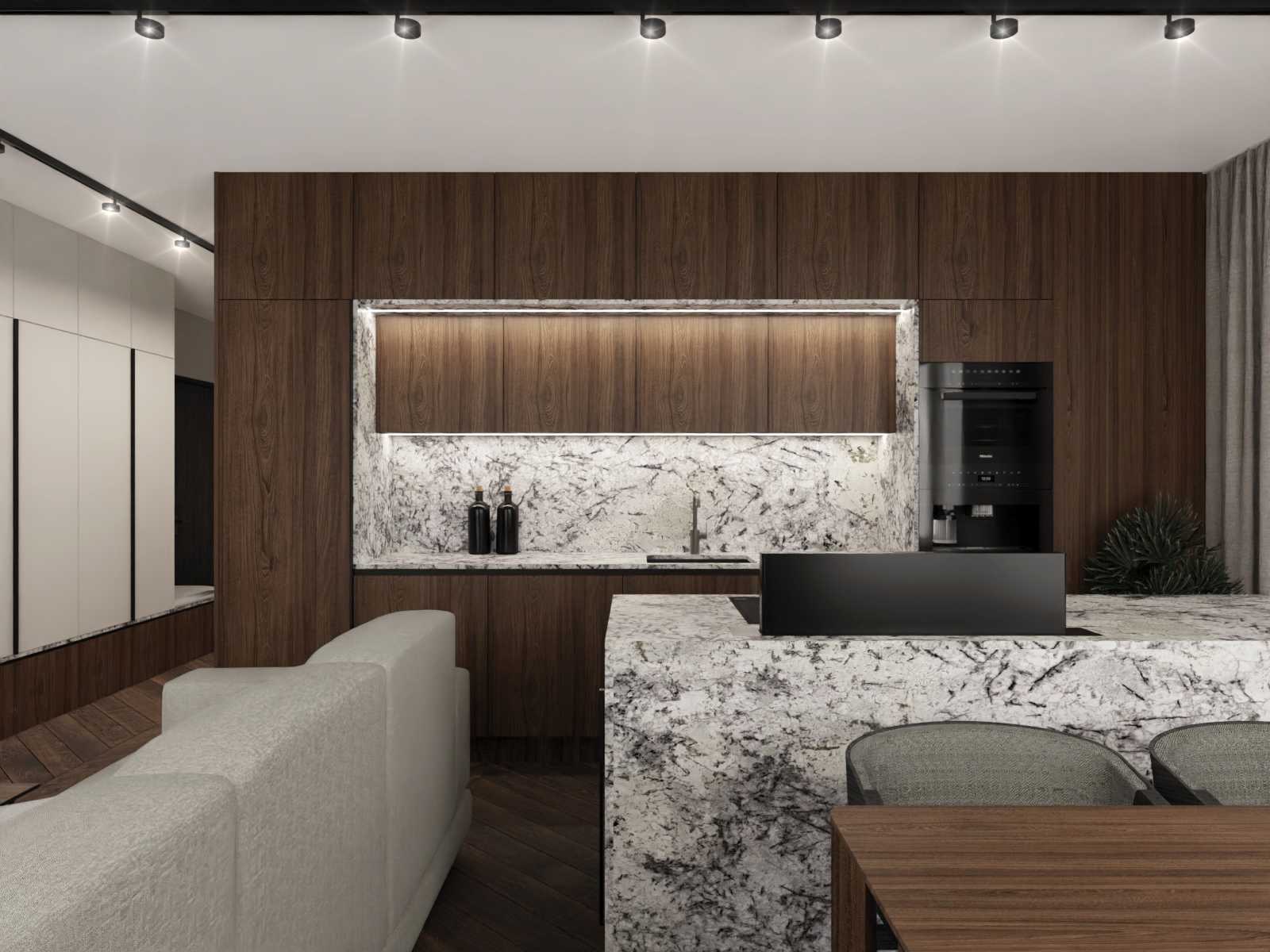 Nowoczesna kuchnia z drewnianymi szafkami, blatem z jasnego kamienia z ciemnymi żyłami, oświetleniem podszafkowym LED i wbudowanym ekspresem do kawy Miele.