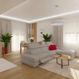 Jasne, przestronne wnętrze salonu z jadalnią, wyposażone w szarą sofę z regulowanymi zagłówkami, okrągły stolik kawowy z drewnianym blatem, drewniany stół z krzesłami, oraz duże okna z białymi...