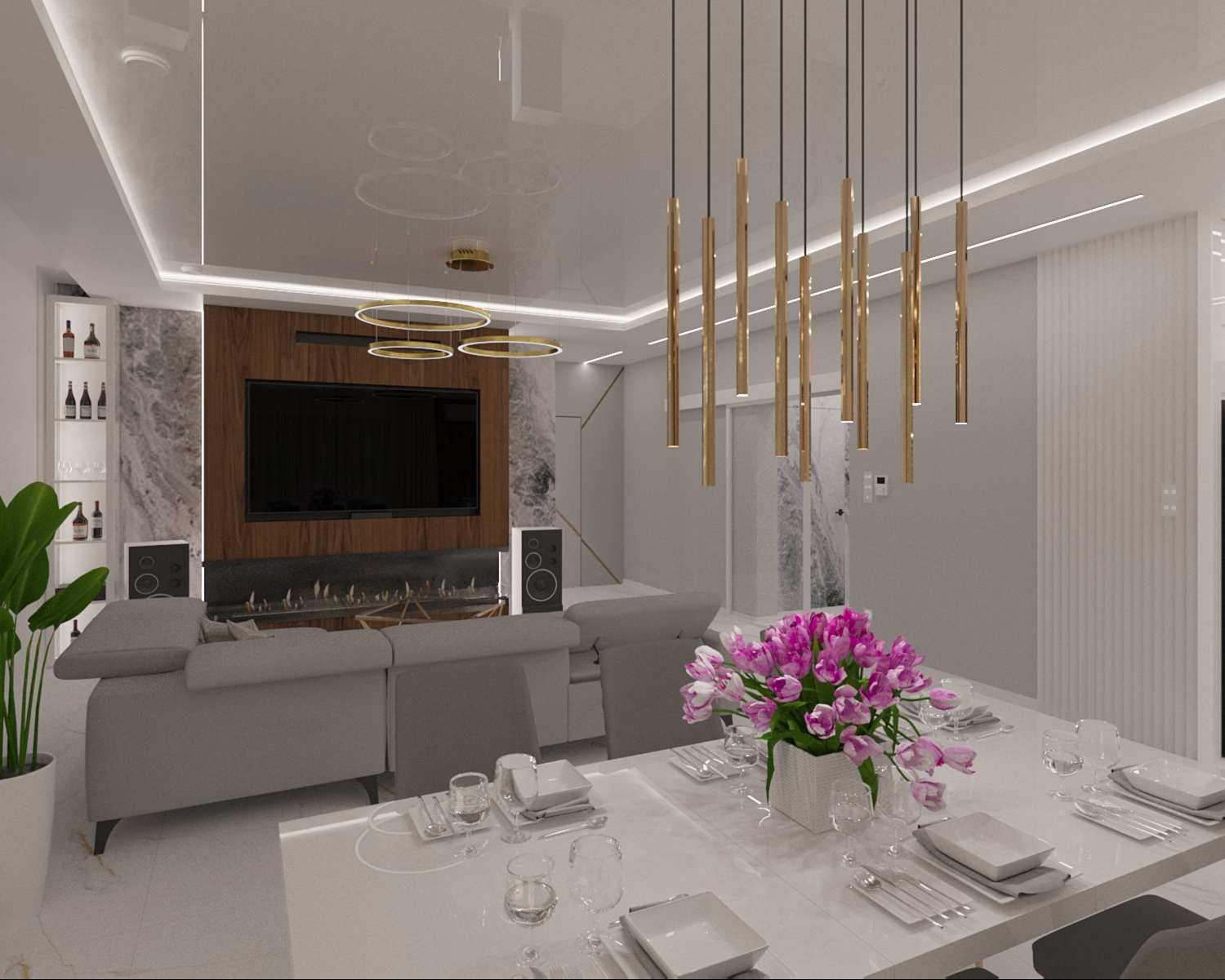 Nowoczesny salon z marmurową ścianą, telewizorem i kominkiem. Nad stołem wiszą złote lampy. Bukiet tulipanów na stole dodaje koloru. Minimalistyczny design.