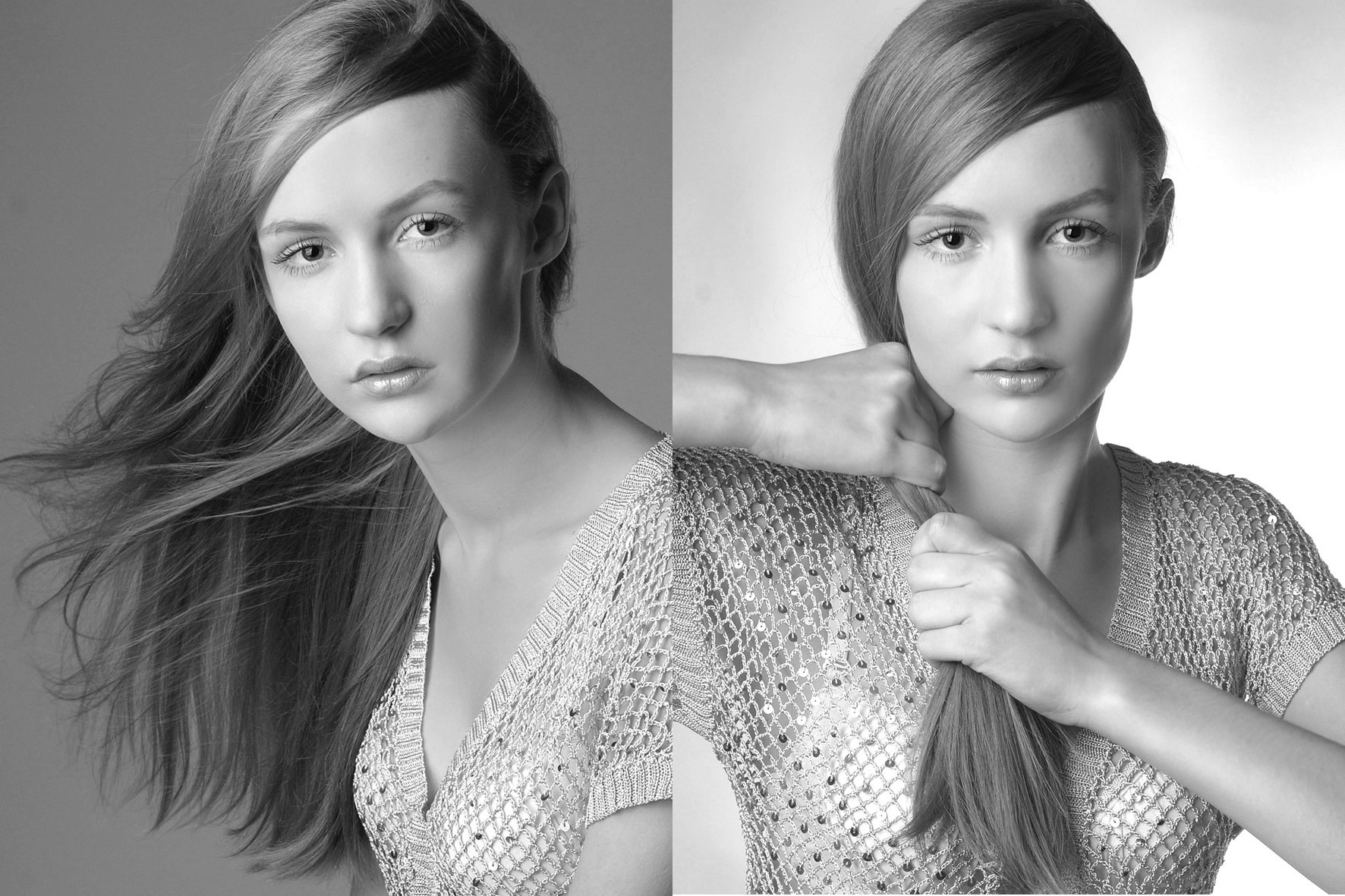 Czarno-białe zbliżenie portretowe młodej kobiety z długimi włosami, po lewej stronie włosy rozwiane, po prawej spięte rękami, ubrana w błyszczącą bluzkę z siateczki.