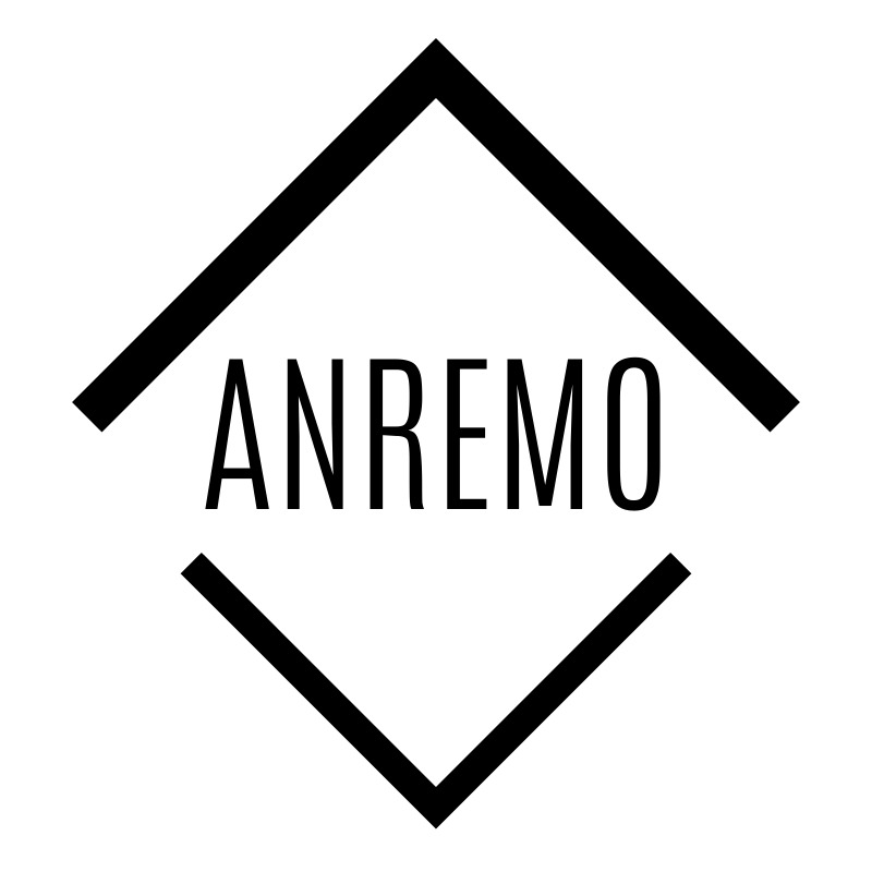 Minimalistyczny, czarno-biały logotyp firmy ANREMO, umieszczony wewnątrz rombu z grubych linii.