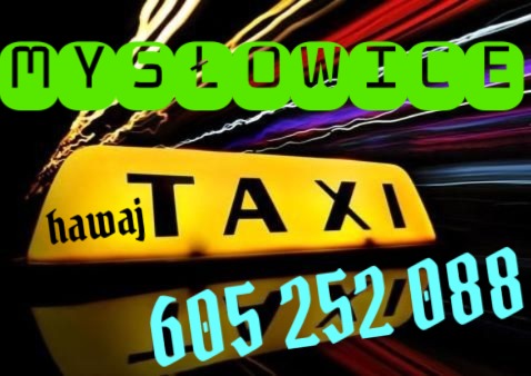 Żółty szyld Taxi 'hawaj' z numerem telefonu 605-252-088 na tle rozmazanych świateł i napisem MYSŁOWICE u góry.
