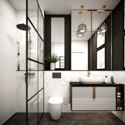 Łazienka w odcieniach czerni i bieli.