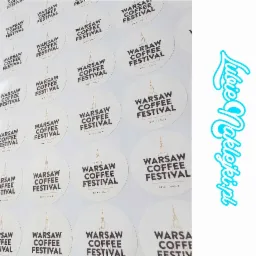 Arkusz z okrągłymi naklejkami Warsaw Coffee Festival 2019 Vol. 5 z motywem warszawskiej syrenki, obok niebieska naklejka z napisem LubieNaklejki.pl.