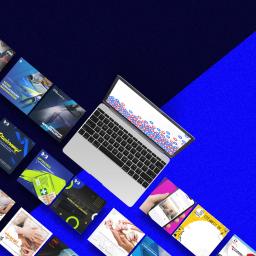 Krasovski.pl - Laptop na niebieskim tle otoczony kwadratowymi grafikami prezentującymi różnorodne projekty, od oznakowania radiowozów po reklamy apteczek i konkursy samochodowe.