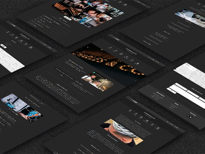 Prezentacja responsywnej strony internetowej Charles & Co. na różnych urządzeniach, widok z perspektywy, ciemna tonacja.