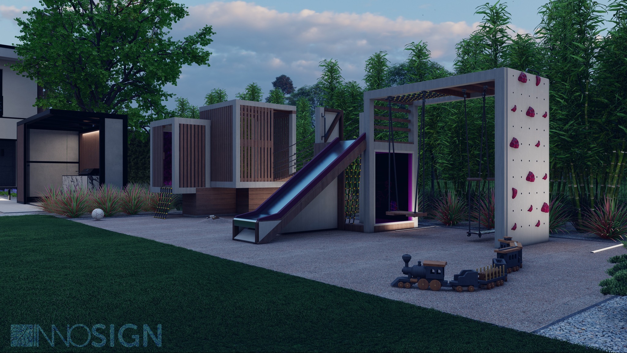 Nowoczesny plac zabaw w ogrodzie z huśtawką, ścianką wspinaczkową, zjeżdżalnią i domkiem, oświetlony ledowymi listwami, z zabawkami w postaci drewnianego pociągu na żwirowej nawierzchni.