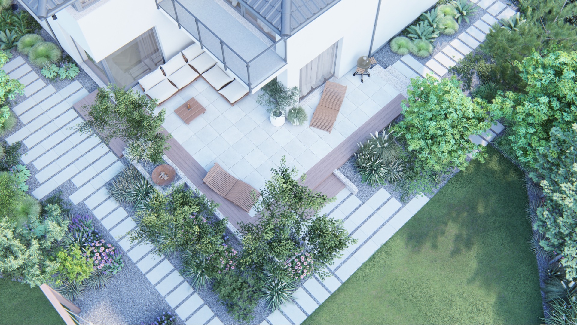 Widok z góry na nowoczesny ogród z białymi płytami chodnikowymi, drewnianym tarasem, leżakami, zielonym trawnikiem i bujną roślinnością.