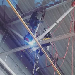 Wzmocnienie konstrukcji pod montaż asekuracji na hali DPD w Strykowie