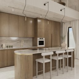 Eco Klima Mateusz Lipiński - Nowoczesna aranżacja kuchni w Bielawie: drewniane szafki, marmurowy blat wyspy z hokerami, designerskie lampy wiszące i jasne, przestronne wnętrze.