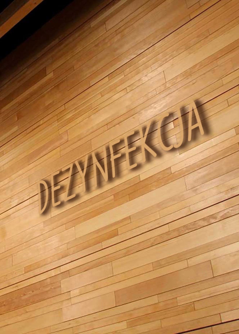 Drewniana ściana z napisem 'DEZYNFEKCJA' z efektem cienia.