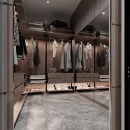 Nowoczesna garderoba z drewnianymi półkami, ubraniami na wieszakach, podświetleniem LED i szarym marmurem na podłodze, widziana z perspektywy wejścia.