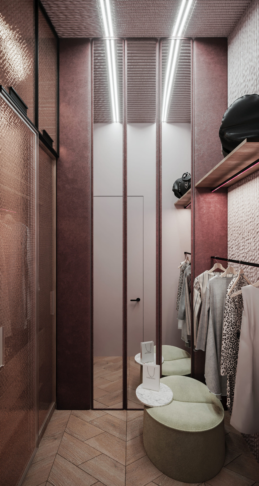Nowoczesna garderoba w odcieniach różu i brązu, z oświetleniem LED, lustrzanymi drzwiami i okrągłym pufem obok stolika z marmurowym blatem.