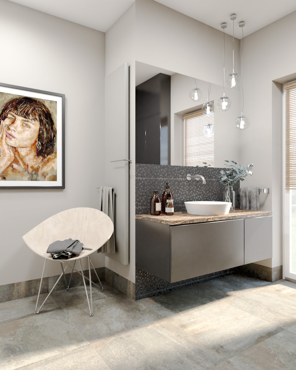 Nowoczesna łazienka z szarą mozaiką, wiszącą szafką z marmurowym blatem, okrągłą umywalką, designerską lampą wiszącą, obrazem w ramie i krzesłem z ubraniami.