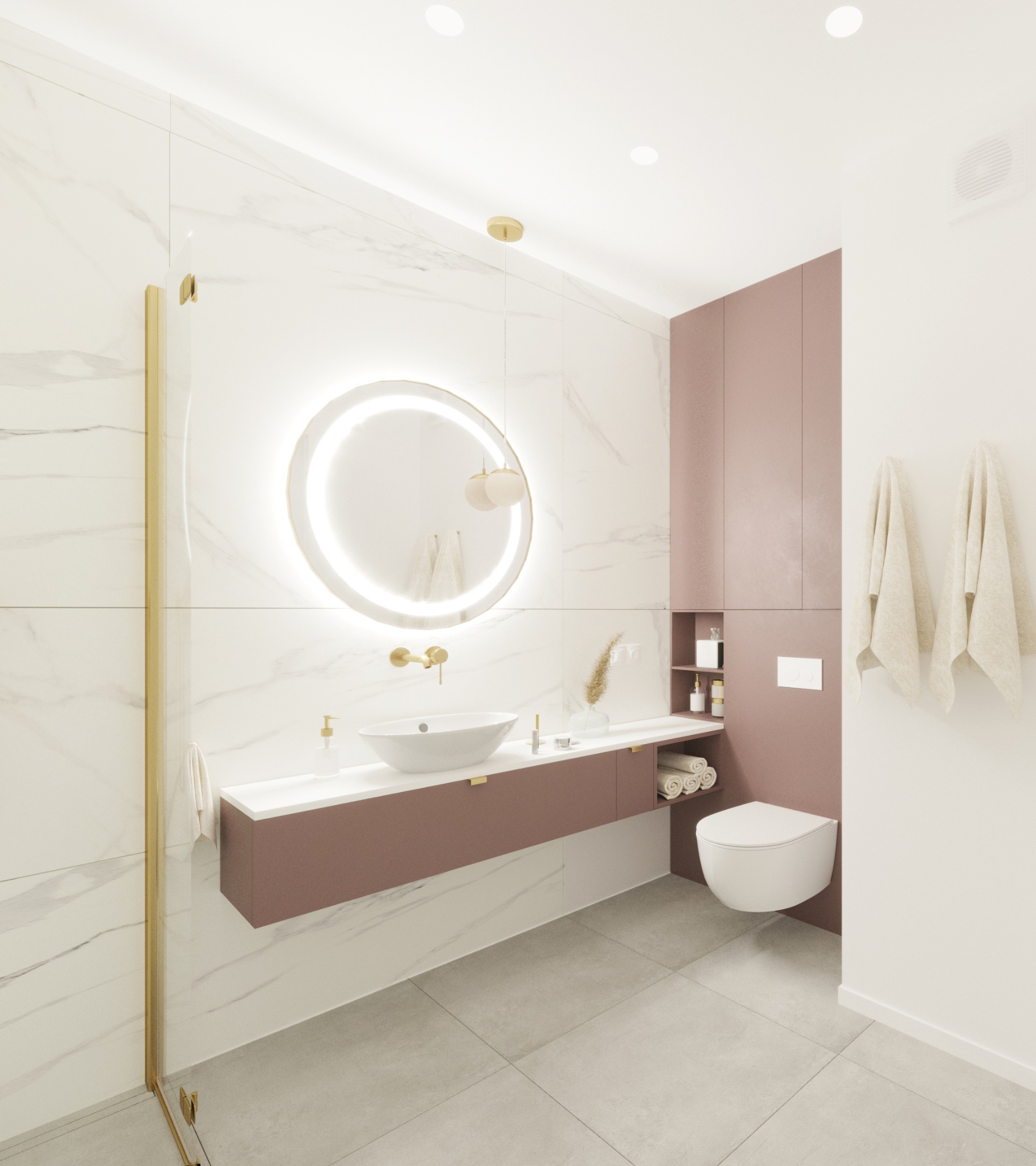 Nowoczesna łazienka z marmurowymi płytkami, okrągłym lustrem z podświetleniem LED, wiszącą umywalką w kolorze pudrowego różu i toaletą podwieszaną. Złote akcenty w armaturze i ramie kabiny...