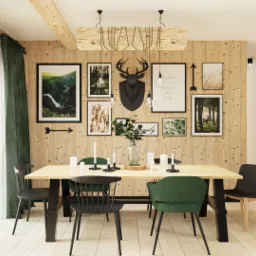 Jadalnia w stylu rustykalnym z drewnianymi ścianami, stołem z jasnego drewna, czarnymi i zielonymi krzesłami, dekoracjami ściennymi z motywami leśnymi i oryginalnym oświetleniem.