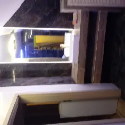 zabudowa w łazience regips obudowany płytkami + lustro z LED