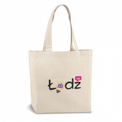 Beżowa torba bawełniana z nadrukowanym logo 'Łódź hub' w kolorach czarnym, różowym, niebieskim i żółtym, na białym tle.