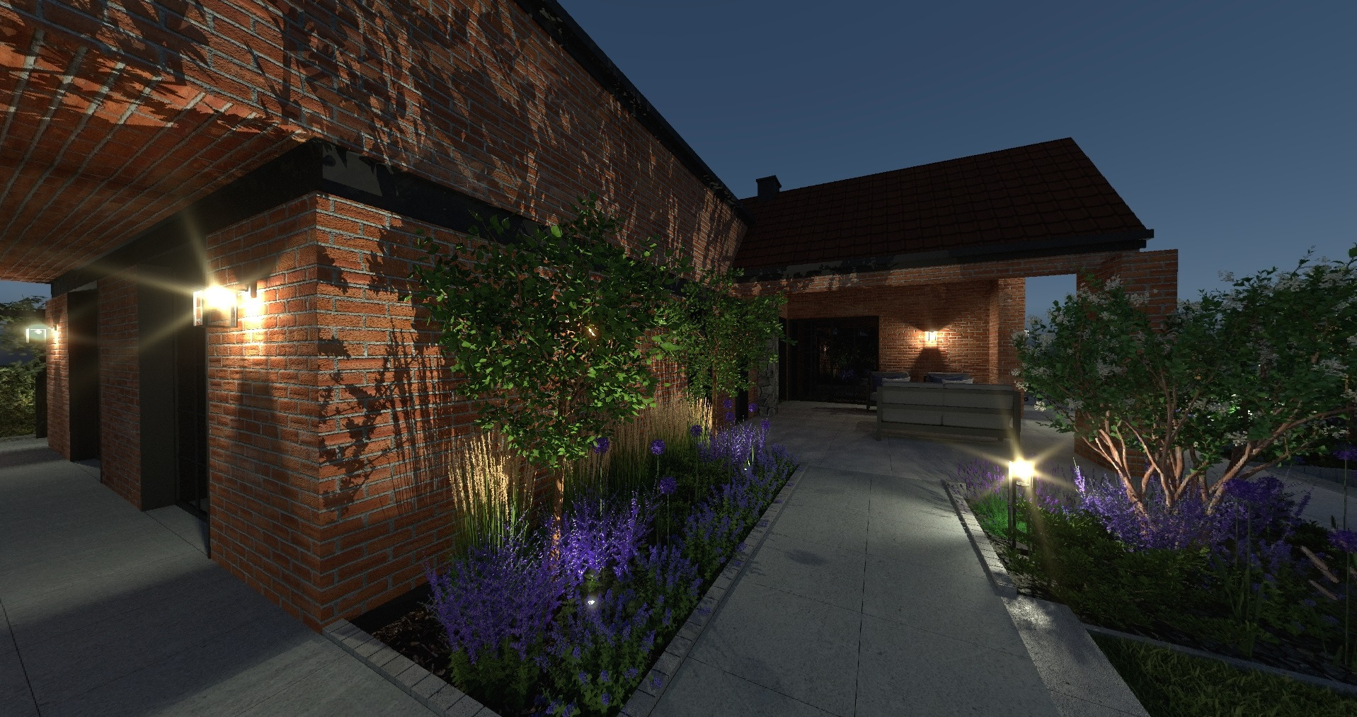 Oświetlony ogród po zmroku z kwitnącymi lawendami wzdłuż ścieżki. Ceglana elewacja budynku z lampami ściennymi. Projekt ogrodu z elementami architektury.