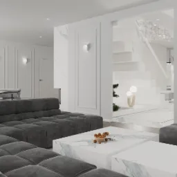 Elegancki salon w bieli i szarości. Duży, modułowy narożnik, marmurowe stoliki kawowe i schody z kryształowym żyrandolem. Minimalistyczny design z dbałością o detale.