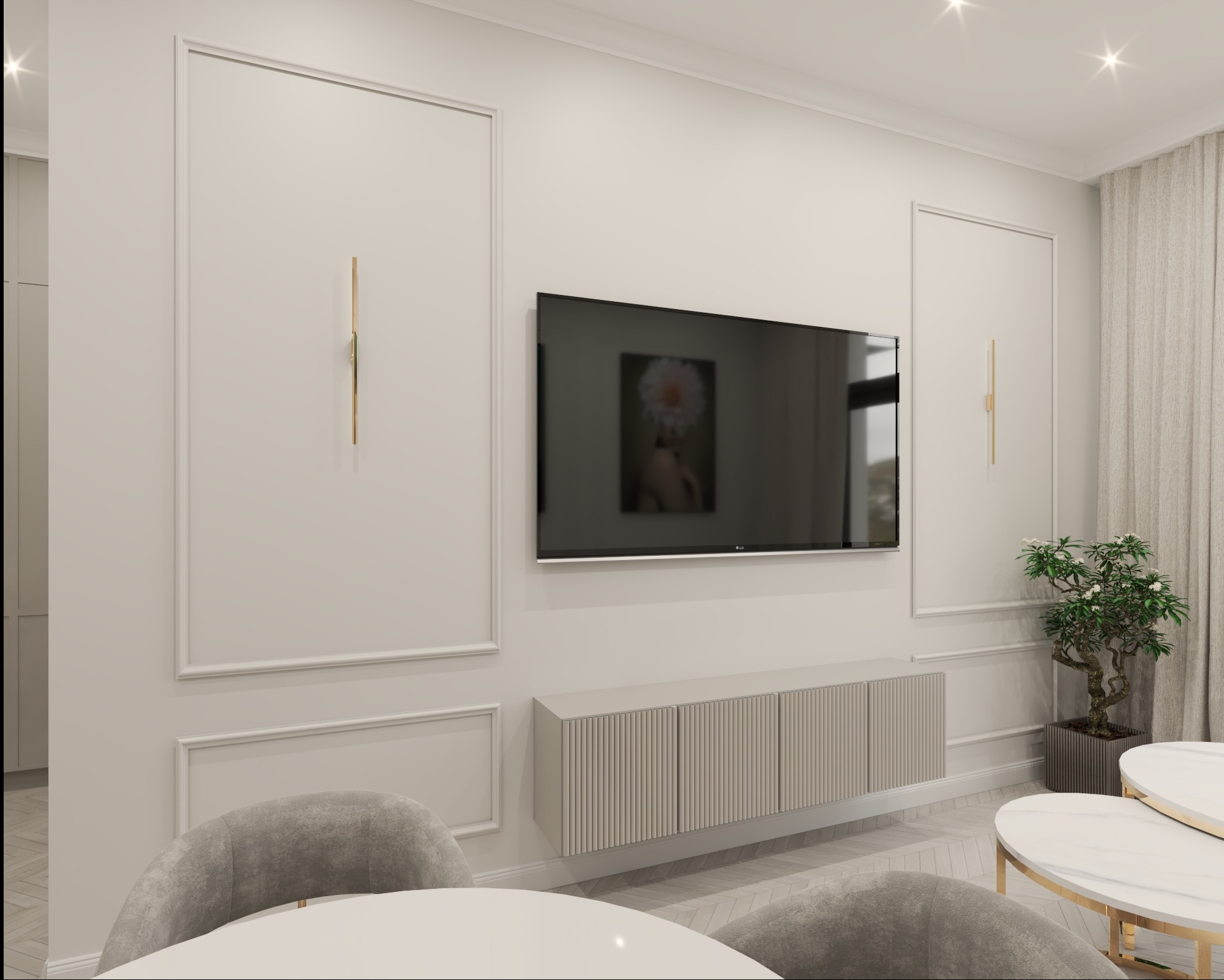 Elegancki salon w odcieniach beżu z telewizorem, minimalistyczną komodą, okrągłymi stolikami i krzesłami. Dekoracyjne panele ścienne i oświetlenie akcentują nowoczesny design.