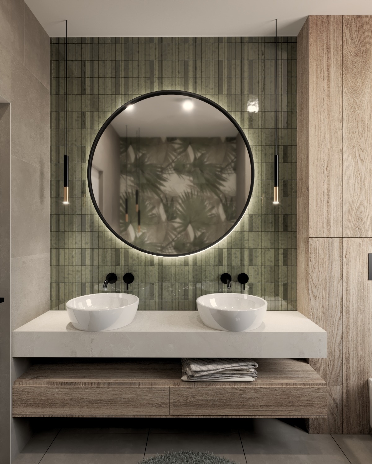 Nowoczesna łazienka z dwoma umywalkami nablatowymi, okrągłym lustrem z podświetleniem LED i drewnianą szafką pod umywalką. W tle zielona mozaika.
