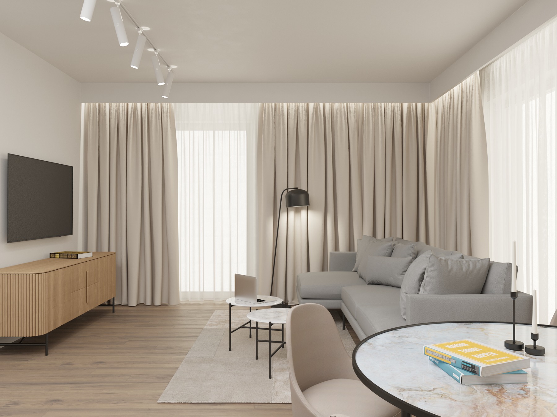 Jasne, przestronne wnętrze salonu z szarą sofą narożną, marmurowym stolikiem kawowym, drewnianą komodą RTV i beżowymi zasłonami.