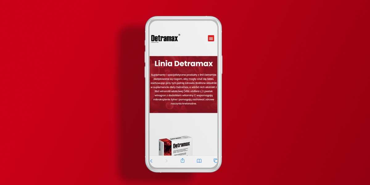 Ekran smartfona prezentujący stronę internetową marki Detramax na czerwonym tle.