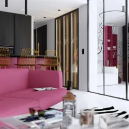 Nowoczesne wnętrze mieszkania z r&oacute;żową sofą, złotymi krzesłami barowymi i czarnymi szafkami kuchennymi, widok na pok&oacute;j za szklanymi drzwiami z mapą na ścianie.