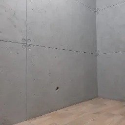 Surowa ściana z szarego betonu architektonicznego, podzielona na płyty z widocznymi otworami montażowymi, uzupełniona drewnopodobną podłogą z paneli.