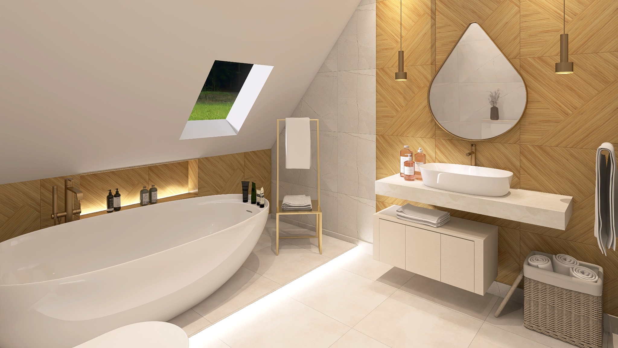 Jasna łazienka na poddaszu z oknem dachowym, wolnostojącą wanną i drewnianą mozaiką na ścianach. Umywalka wpuszczona w blat, okrągłe lustro i złote detale.