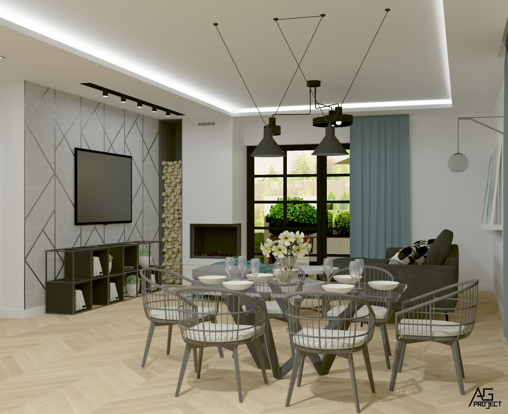 Nowoczesna aranżacja salonu z jadalnią: szary stół z krzesłami, dekoracyjna ściana z telewizorem, kominek z drewnem i widok na zielony ogród przez przeszklone drzwi.