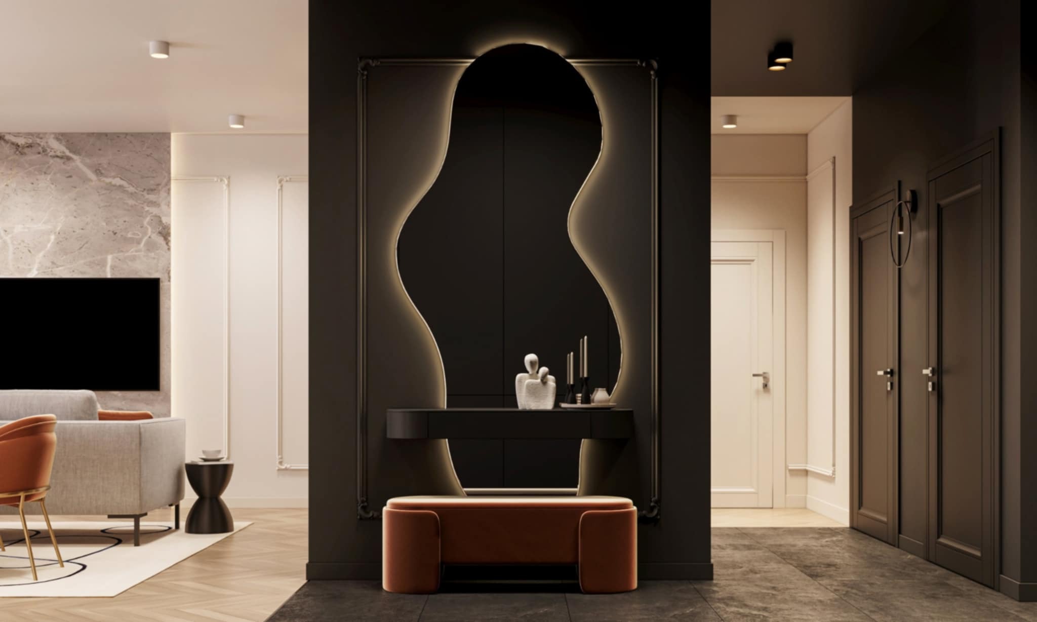 Eleganckie wykończenie wnętrza: ciemna ściana z podświetlanym lustrem o nieregularnym kształcie, konsola i pufa, widok na salon z sofą i marmurową ścianą.