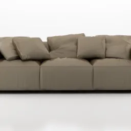 Nowoczesna, modułowa sofa w odcieniach beżu, z kwadratowymi poduszkami, ustawiona na białym tle, ukazująca minimalistyczny design i gładką teksturę materiału.