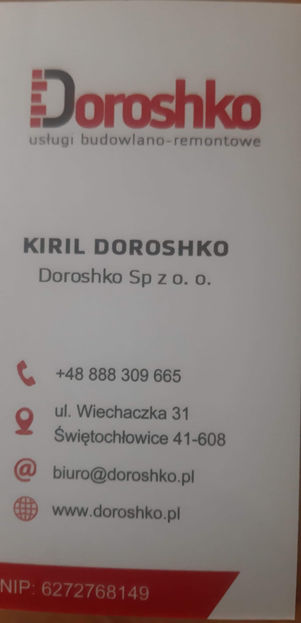 Wizytówka firmy Doroshko świadczącej usługi budowlano-remontowe, zawierająca logo, dane kontaktowe i NIP.