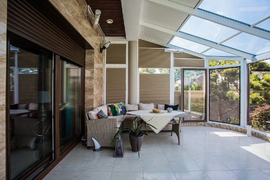 Ogród zimowy, rolety integro, rolety plisowane, moskitiery.