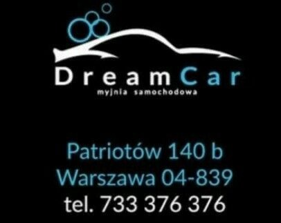 Logo myjni samochodowej Dream Car z adresem Patriotów 140b, Warszawa i numerem telefonu 733 376 376 na czarnym tle.