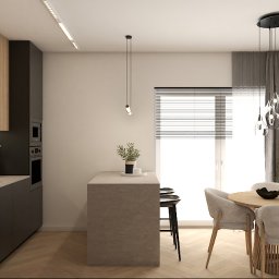 Stylownia Magdalena Szumiec - Nowoczesna kuchnia z wyspą i jadalnią w neutralnej kolorystyce. Drewniane szafki, czarne akcenty, minimalistyczne oświetlenie i parkiet w jodełkę tworzą spójną całość.