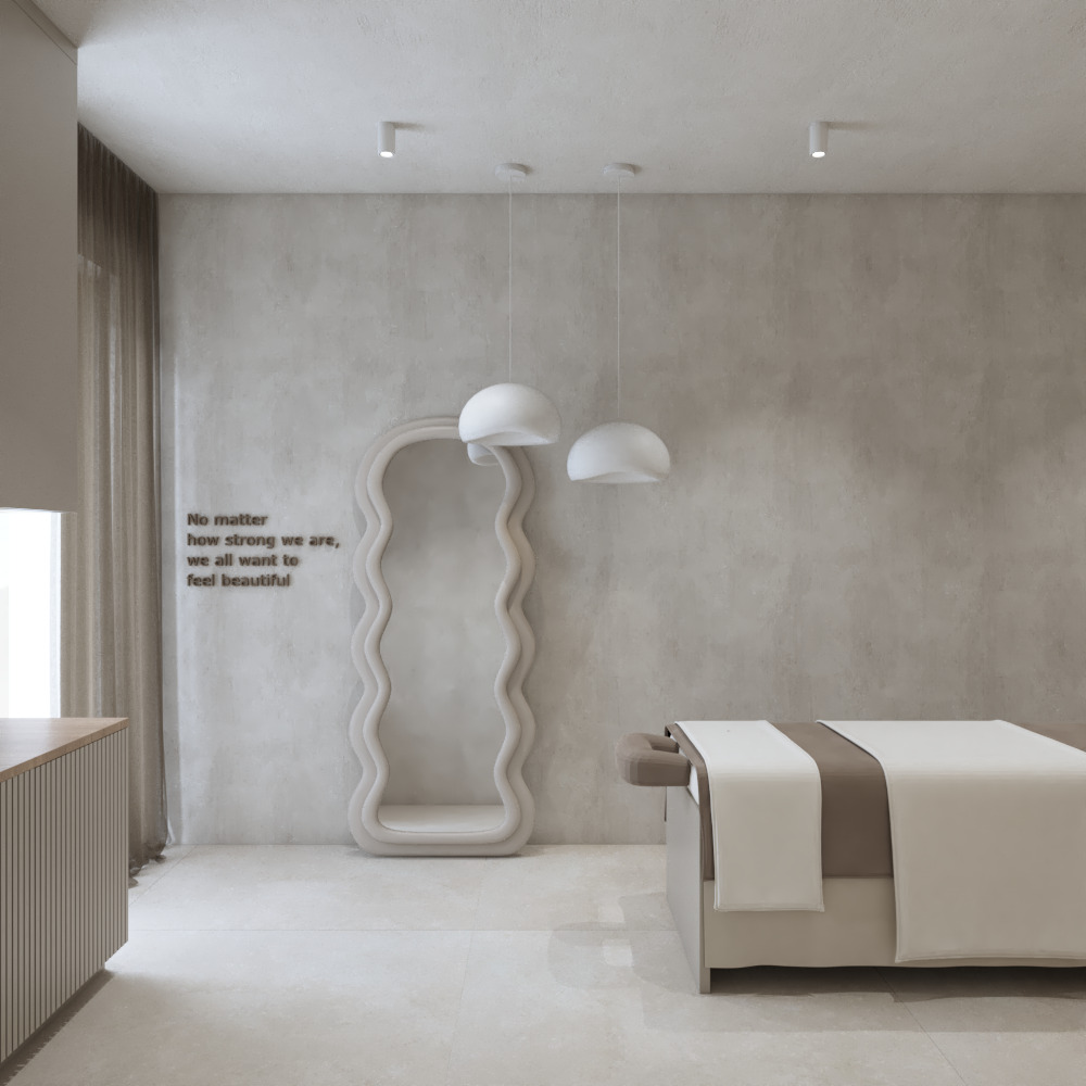 Minimalistyczne wnętrze salonu kosmetycznego z beżową kolorystyką, falistym lustrem, lampami wiszącymi i tekstem na ścianie. Widoczny stół do masażu.