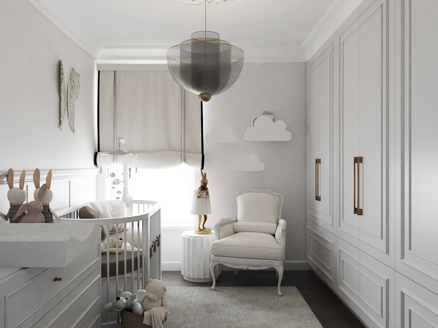 Jasne wnętrze pokoju dziecięcego z owalnym łóżeczkiem, pluszowymi zabawkami, dekoracjami chmurkami i szafą w zabudowie z frezowanymi frontami.