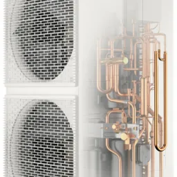 Wizualizacja przekroju pompy ciepła Panasonic Inverter ukazująca wewnętrzne miedziane rury i elementy konstrukcyjne.