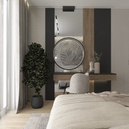 DESIGNKING KINGA KUPIJAJ - Stylowa sypialnia w Ostrowie Wielkopolskim z toaletką, okrągłym lustrem z motywem liści i dużym oknem z widokiem na zieleń. Minimalistyczny design i naturalne światło.