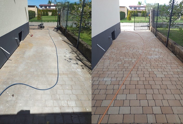 Porównanie stanu kostki brukowej przed i po czyszczeniu, widoczny wąż ciśnieniowy i różnica w kolorze kostki po umyciu.
