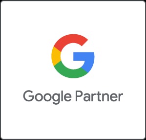 Certyfikat Google Partner z logo Google w kolorach: czerwonym, żółtym, zielonym i niebieskim. Szary napis 'Google Partner' na białym tle.