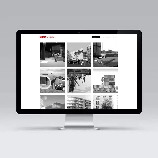 Ekran komputera iMac wyświetlający czarno-białą galerię zdjęć projektów architektonicznych firmy PUMA architekci, prezentowanych na stronie internetowej.